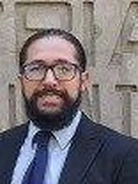 Dr. Assad Saad